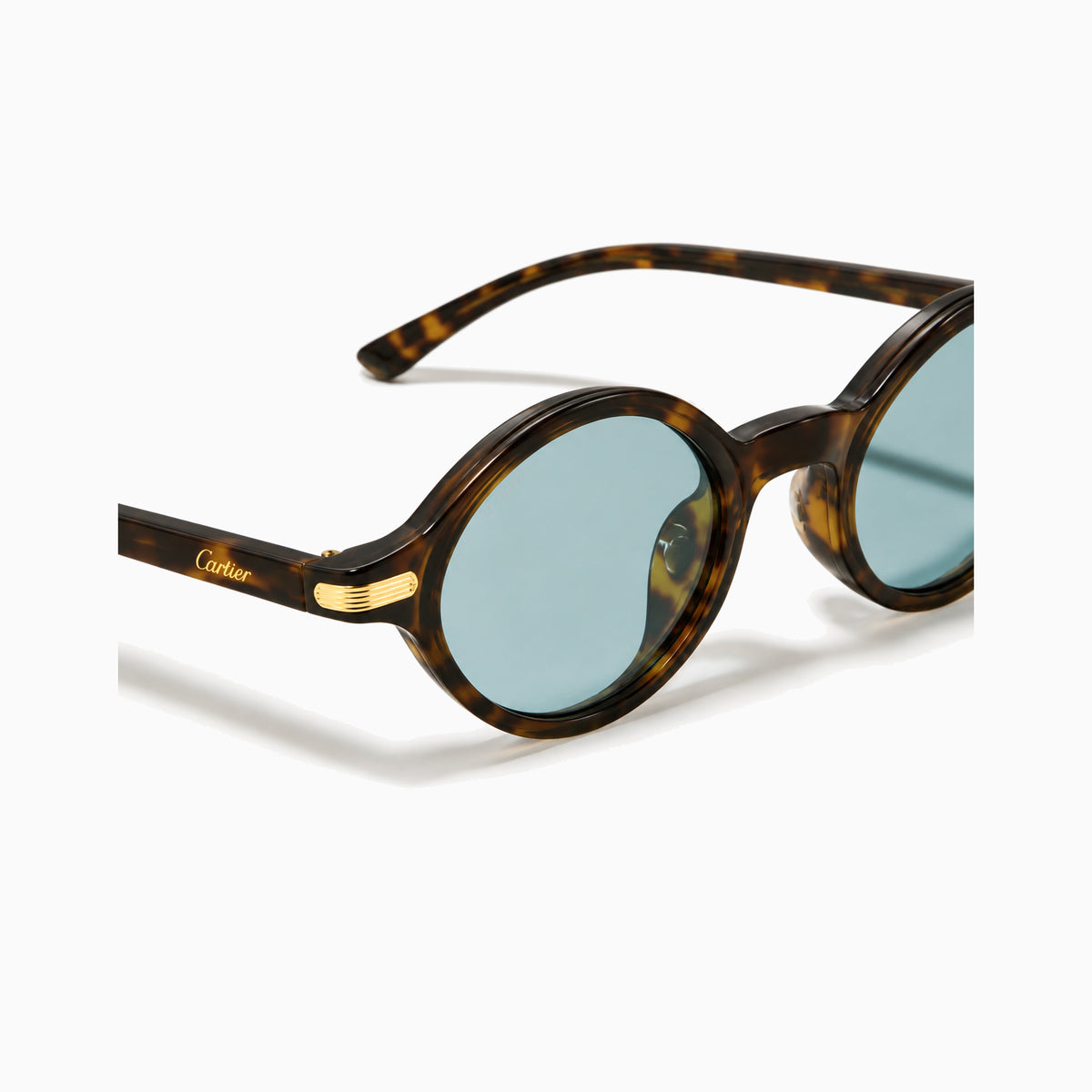 Cartier Trinity Round — Tortoise / Blue close view
